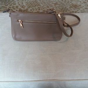 NWOT Beige cross body purse with gold accents